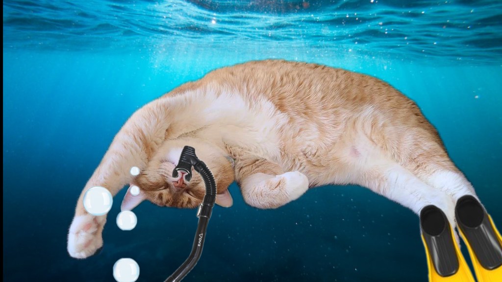 The same orange cat, photoshopped underwater. He appears to be wearing a snorkel and a pair of swim fins. 