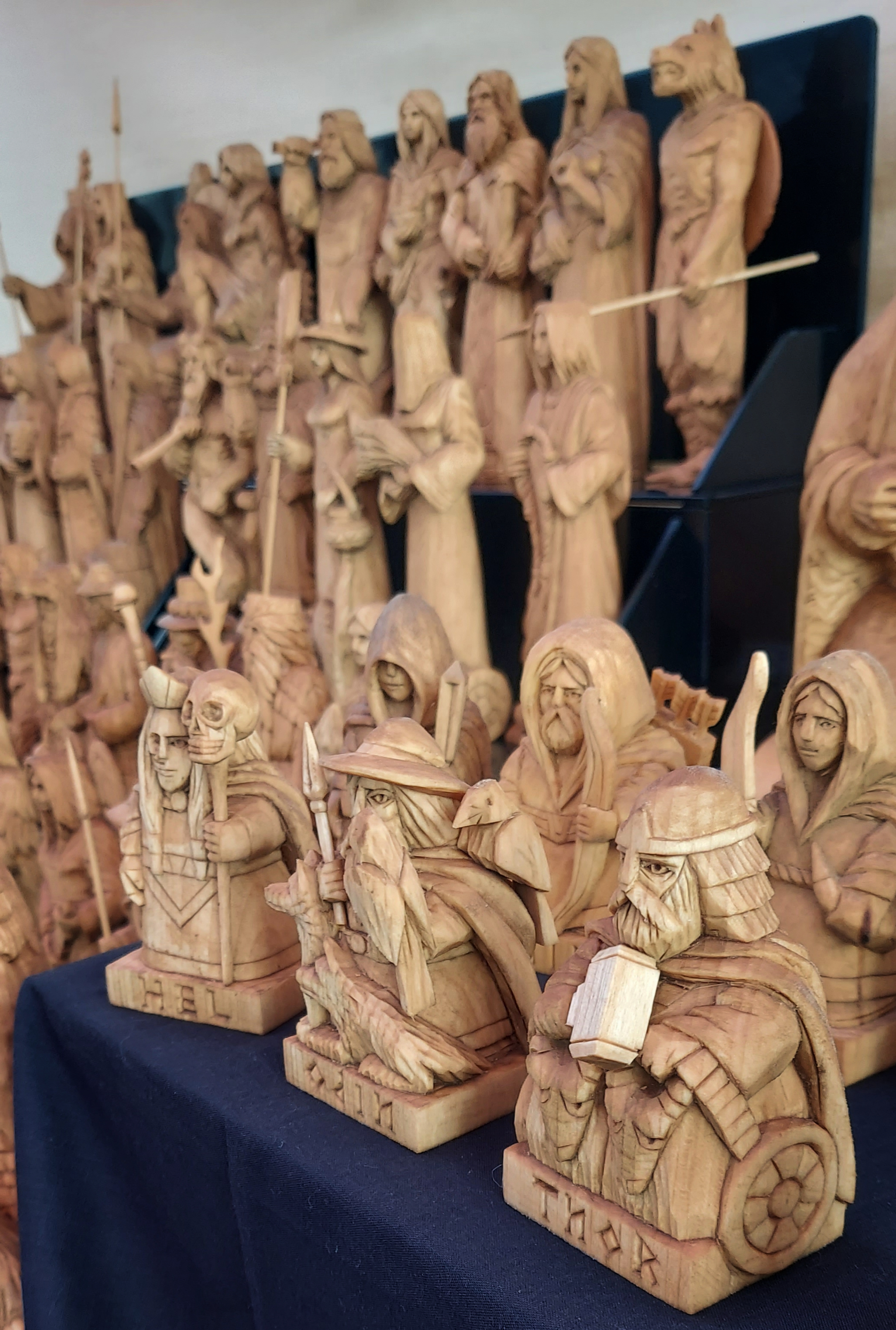 A selection of hand-carved wooden statues of Norse deities. 