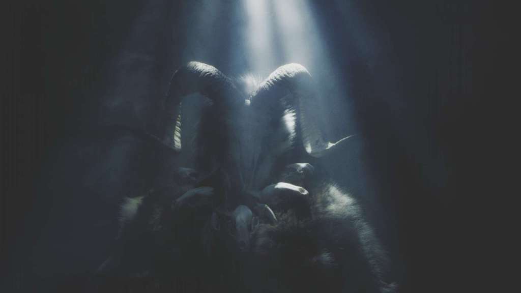 A dim image of a figure dressed in a ram skull and fur cloak of some kind, with a ruff made of rib bones.